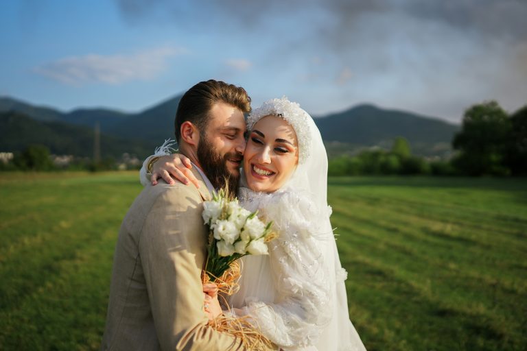 a man and woman in a field