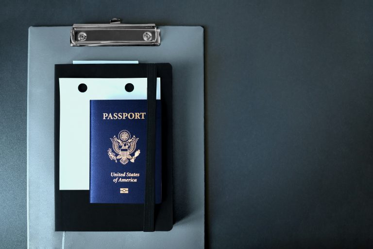 a passport and a clipboard