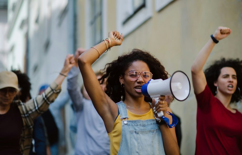 Protesters rallying with megaphone